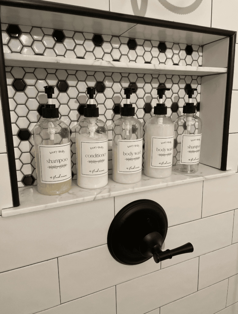 set of refillable shower bottles for guest bathroom products