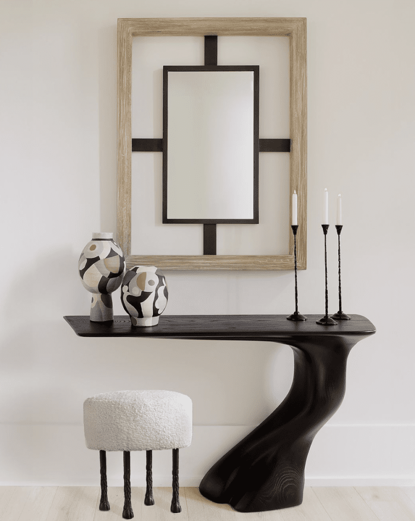 Stylish modern console table to provide an example of how to introduce original pieces into entryway decor