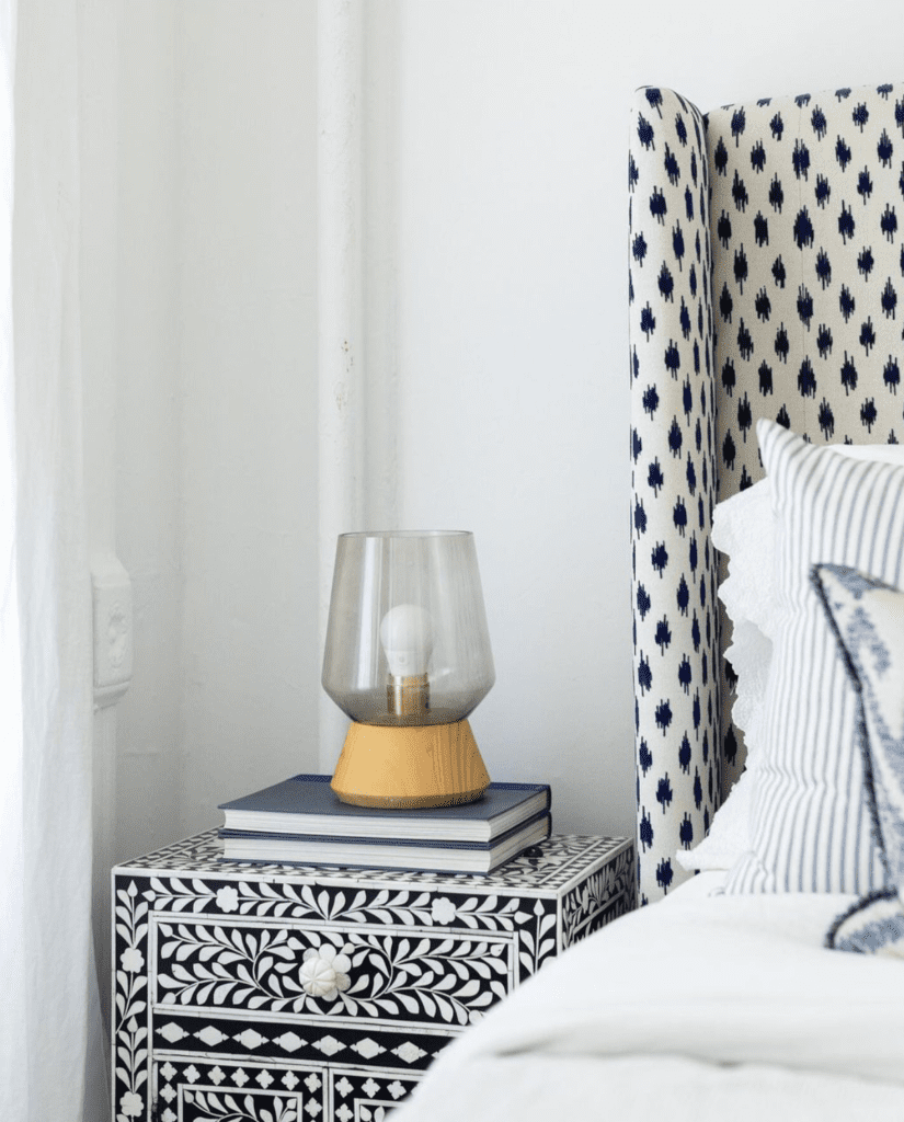 Combination of several patterns to style a maximalist bedroom in a subtle and elegant way