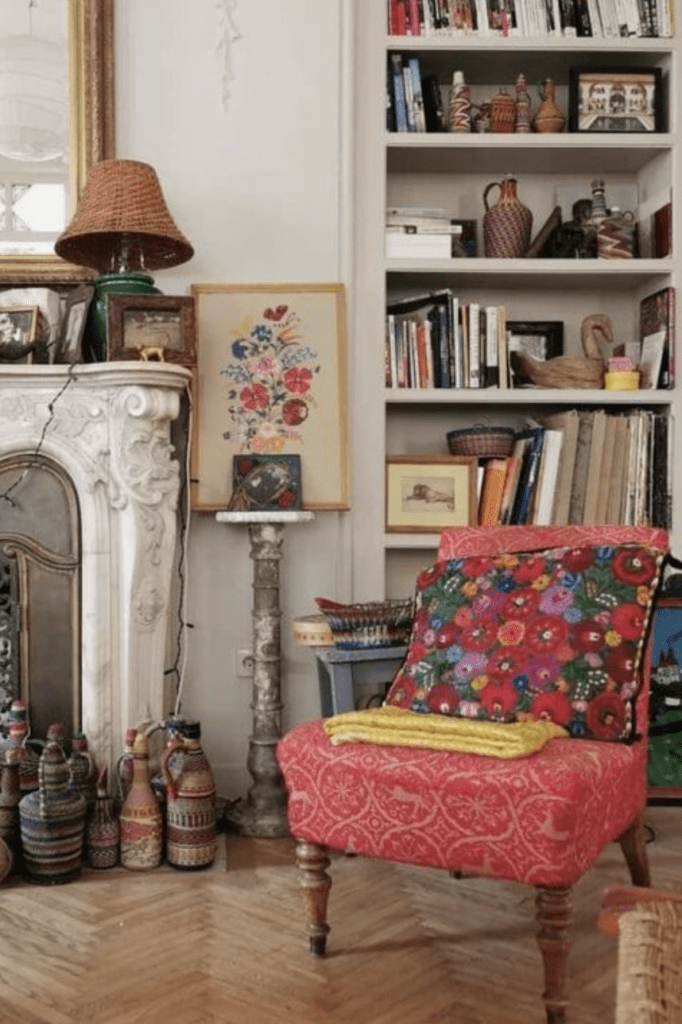 Parisian living room with vintage upholstered armchair in a bright colour. 