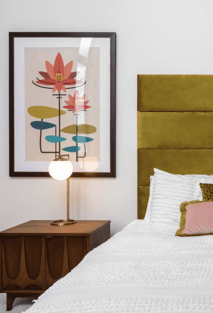 combination of mid century bed side table and modern lamp and print