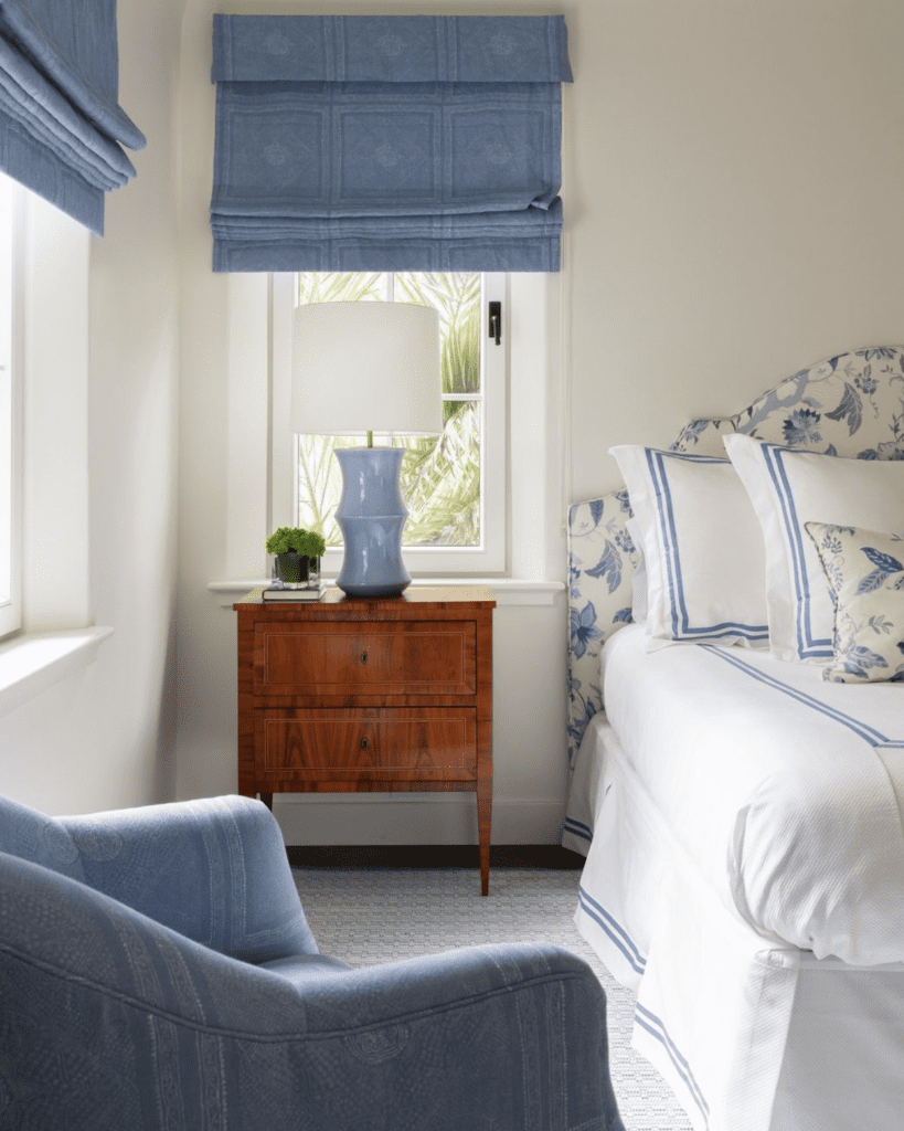 Classic coastal bedroom using a blue and white color palette to recall seaside colors