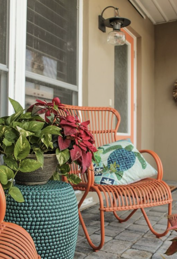 colorful metal porch chairs with ceramic side table