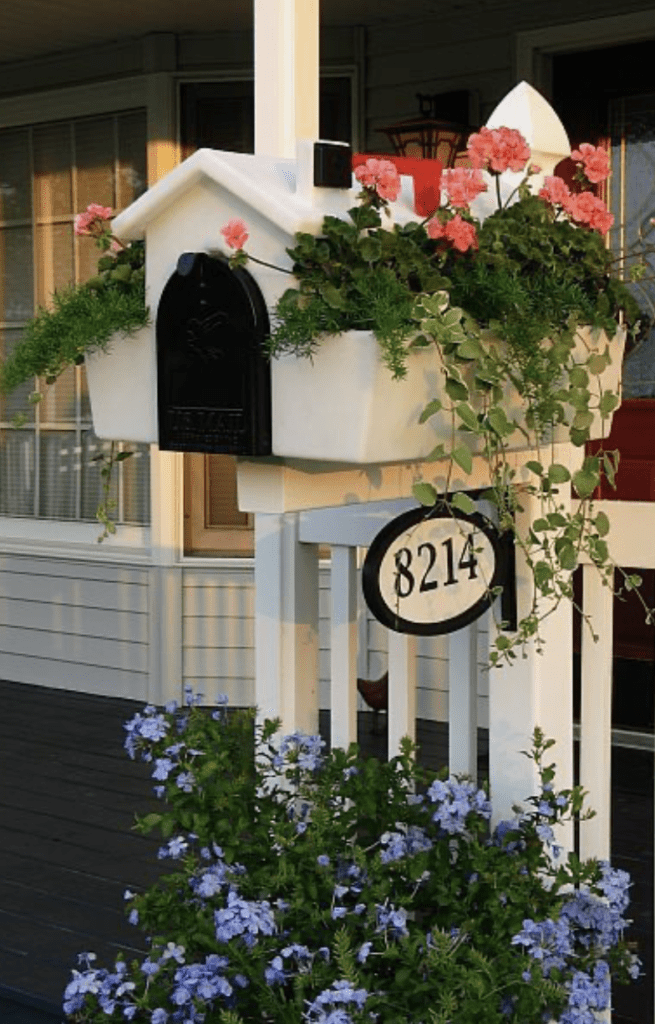 mailbox ideas with cover that can hold flowers on the side