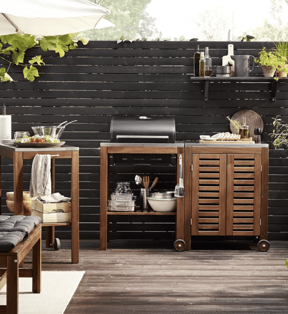 small outdoor kitchen set from Ikea in dark wood