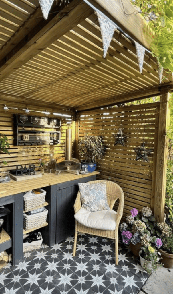 outdoor kitchen using patterned tiles to create space separation