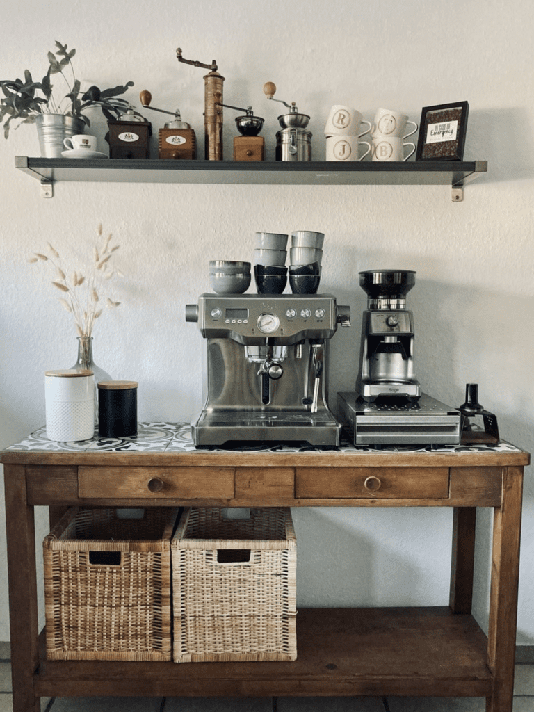 example of a rustic vintage table used as the central piece for a coffee bar