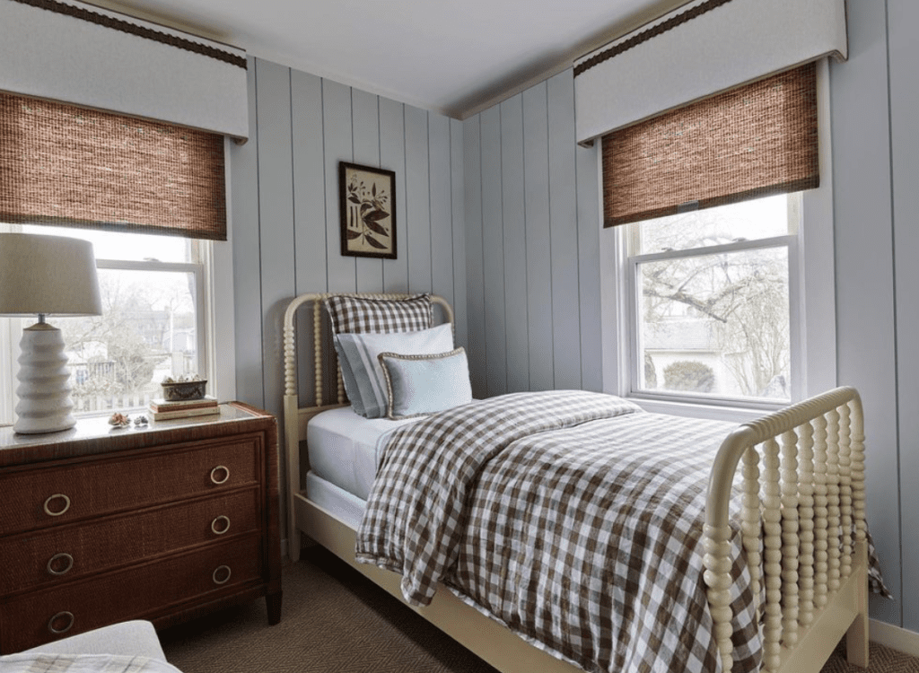 vintage-inspired room with old-fashioned bed frame and decor