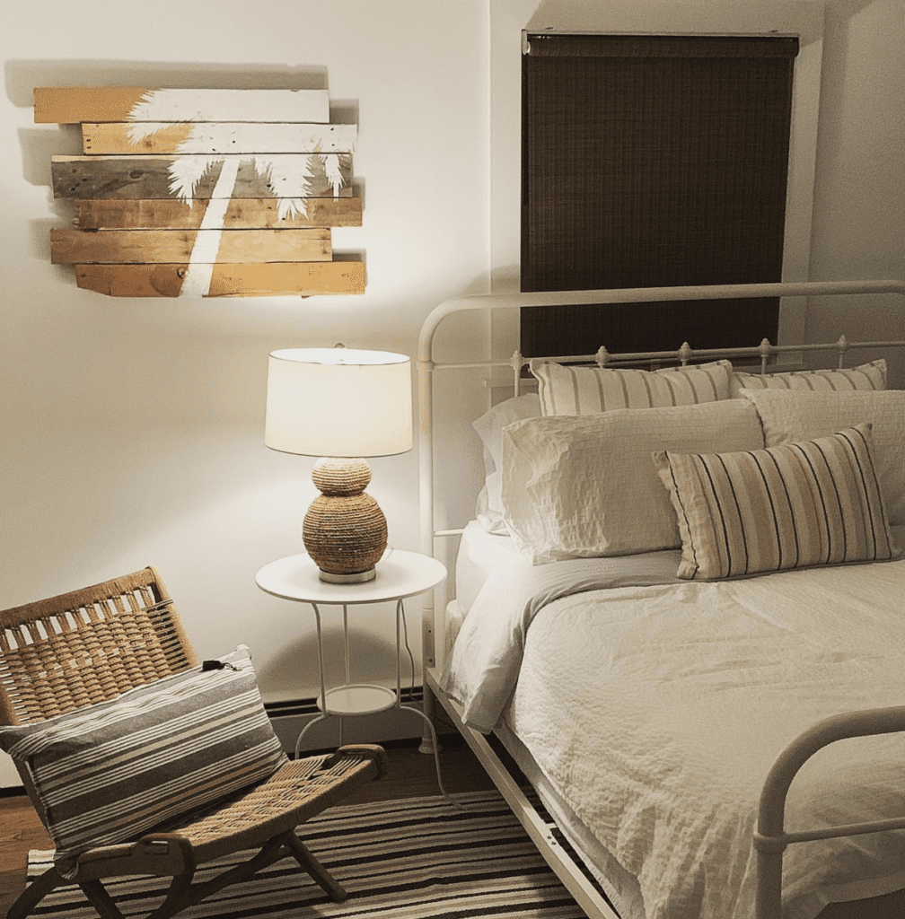 Rattan armchair used as decor in a beachy bedroom