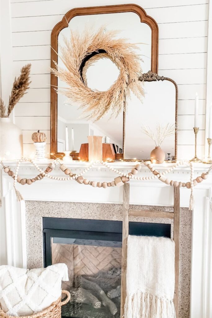 fall mantle decor with pumpkins