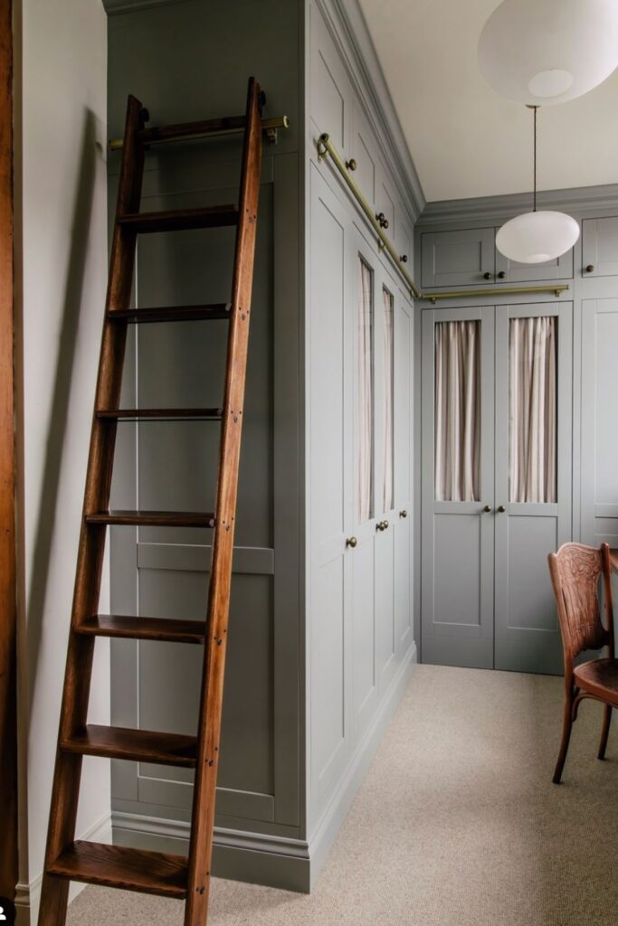 small walk in closet with vanity